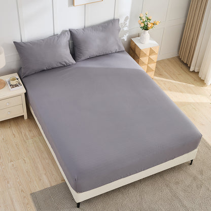 Earth grey organic grounding fitted sheet on bed – luxury earthing bedding by Terra Solum