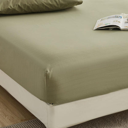 Close-up of olive green organic cotton silver-fiber grounding sheet corner – Terra Solum