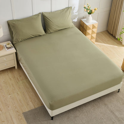 Olive green organic grounding fitted sheet on bed – luxury earthing bedding by Terra Solum